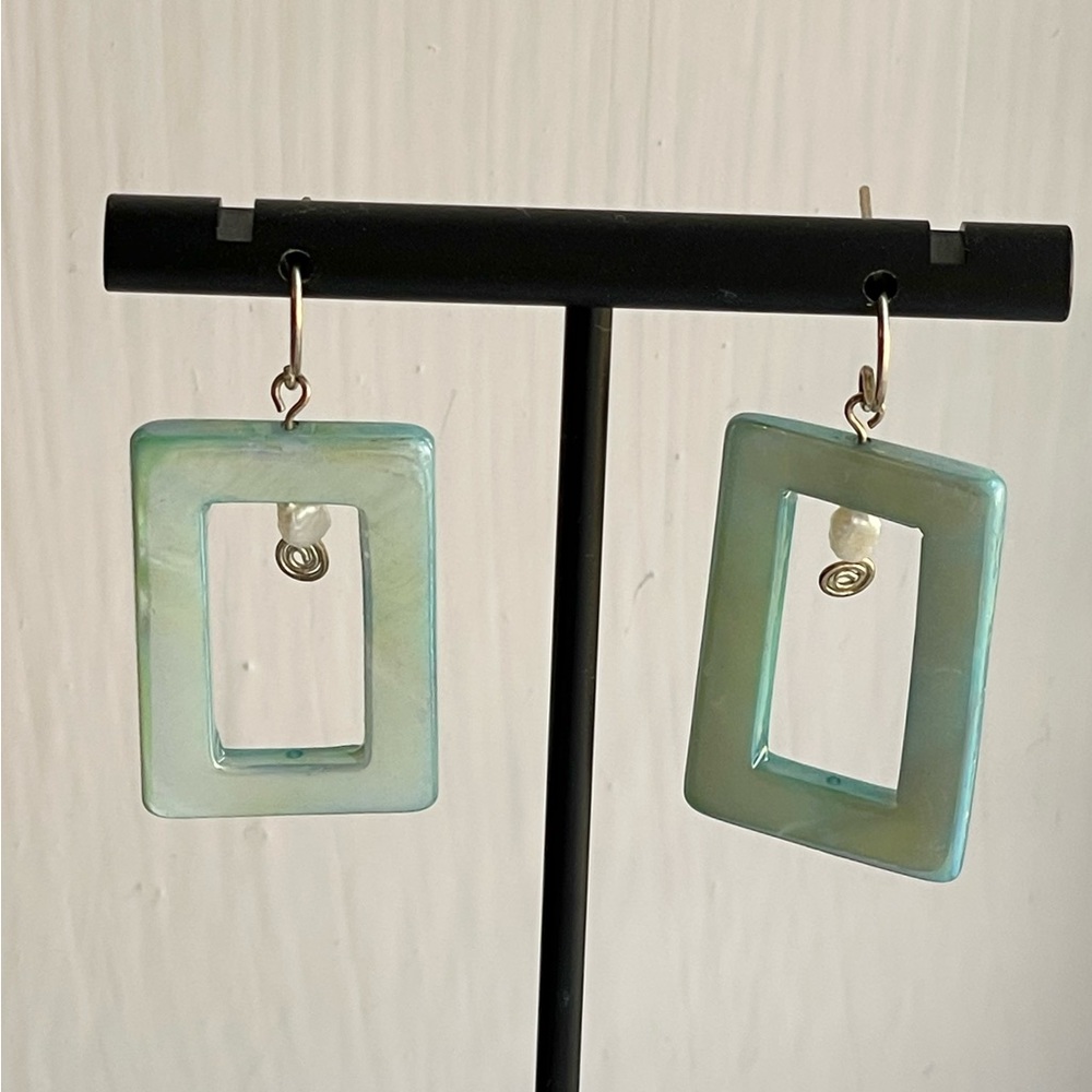 Blue rectangular, acrylic frame earrings with faux pearl.